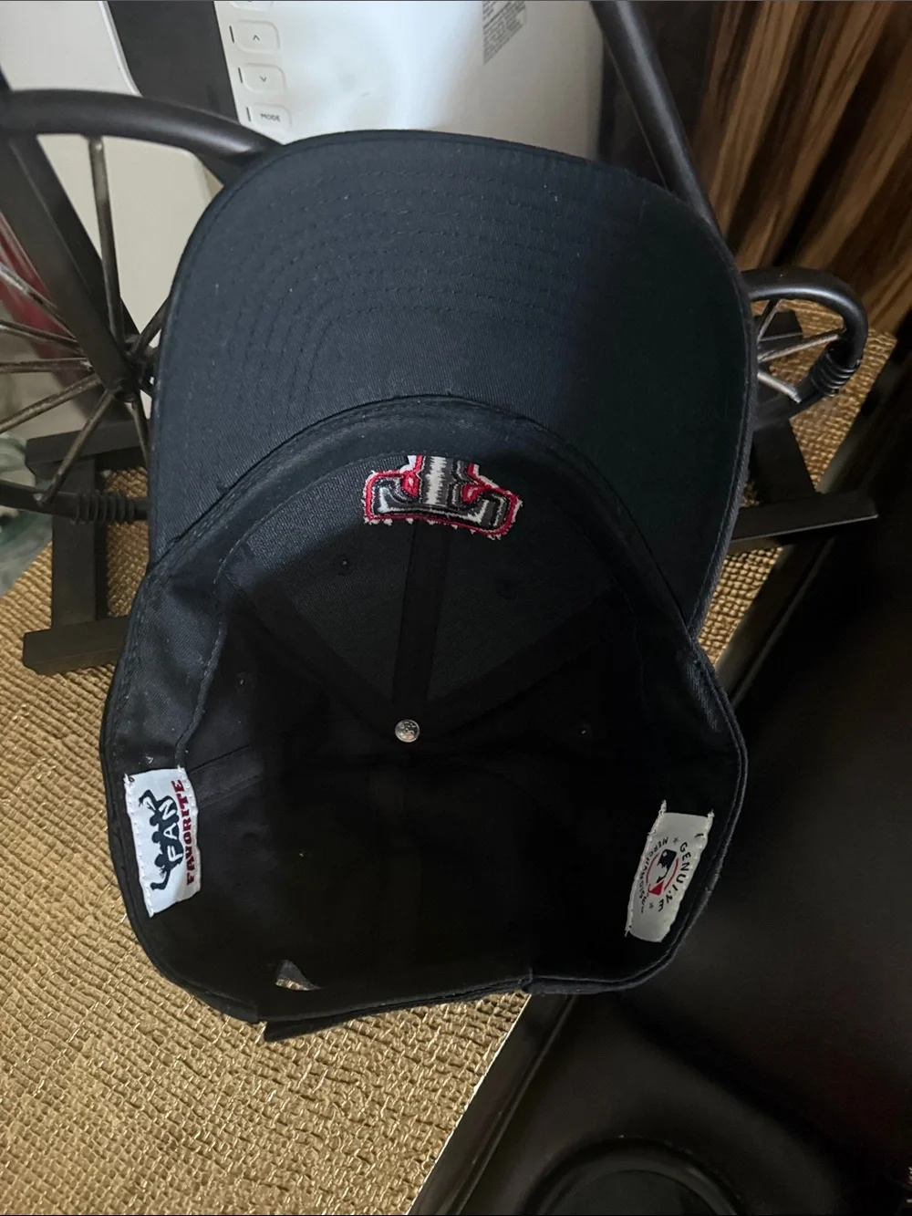 Black Baseball Cap with Embroidered 'T' Logo